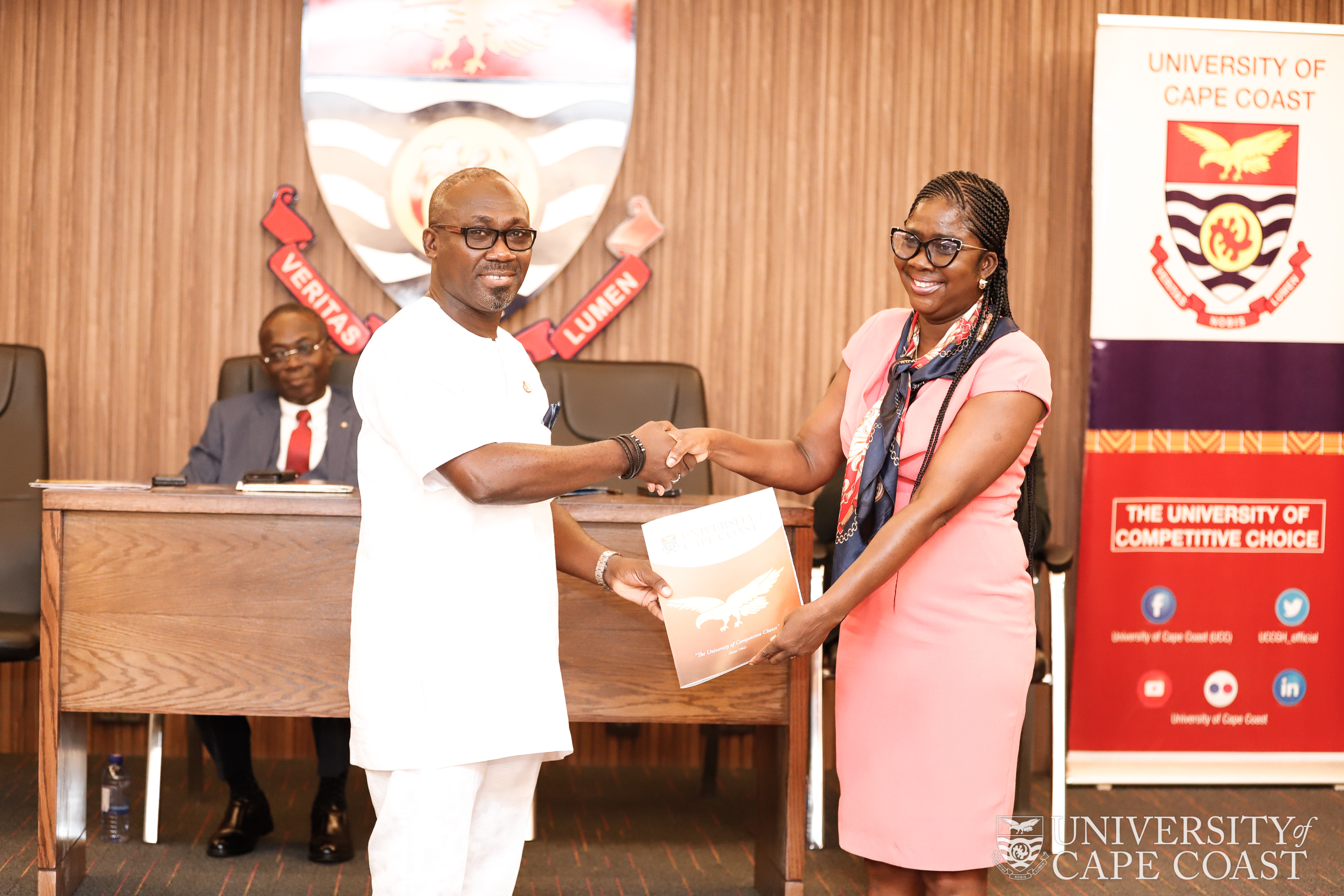 Prof. Rosemond Boohene handing over to Prof. Denis Aheto